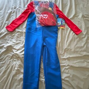 Super Mario costume. Size medium (8-10). Brand new with tags.